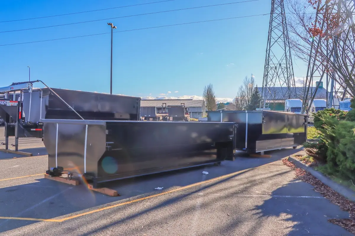 Roll-off dumpster ready for waste disposal at job site for 2 Yard Dumpster Rental in Prairie Village
